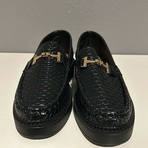 Black platform loafers